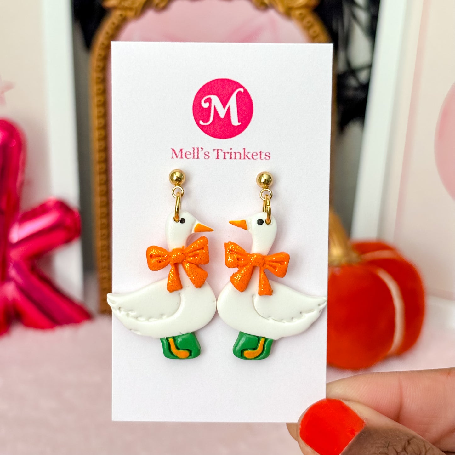 Sparkly Orange Bow Porch Goose Dangles